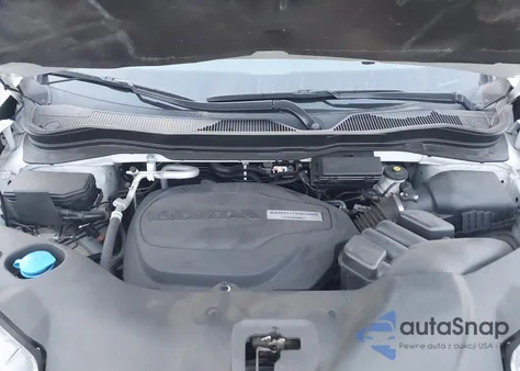 2021 Honda Pilot 2Wd Touring 8 Passenger z USA, uszkodzony, nr VIN 5FNYF5H90MB001707